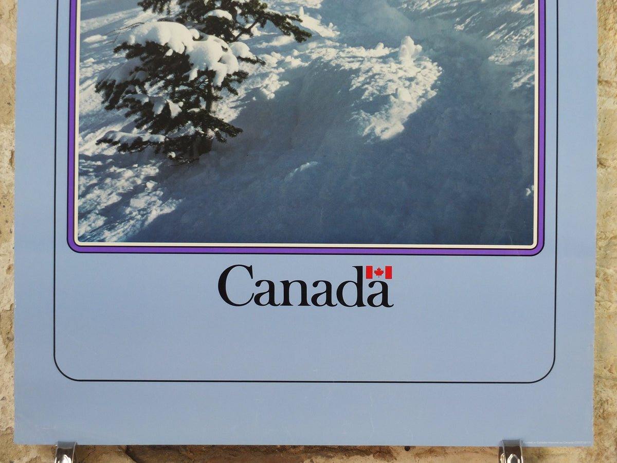 1990s Canada Ski Poster, sking holiday on snowy mountain in blue and white, tourism vacation wall art decor