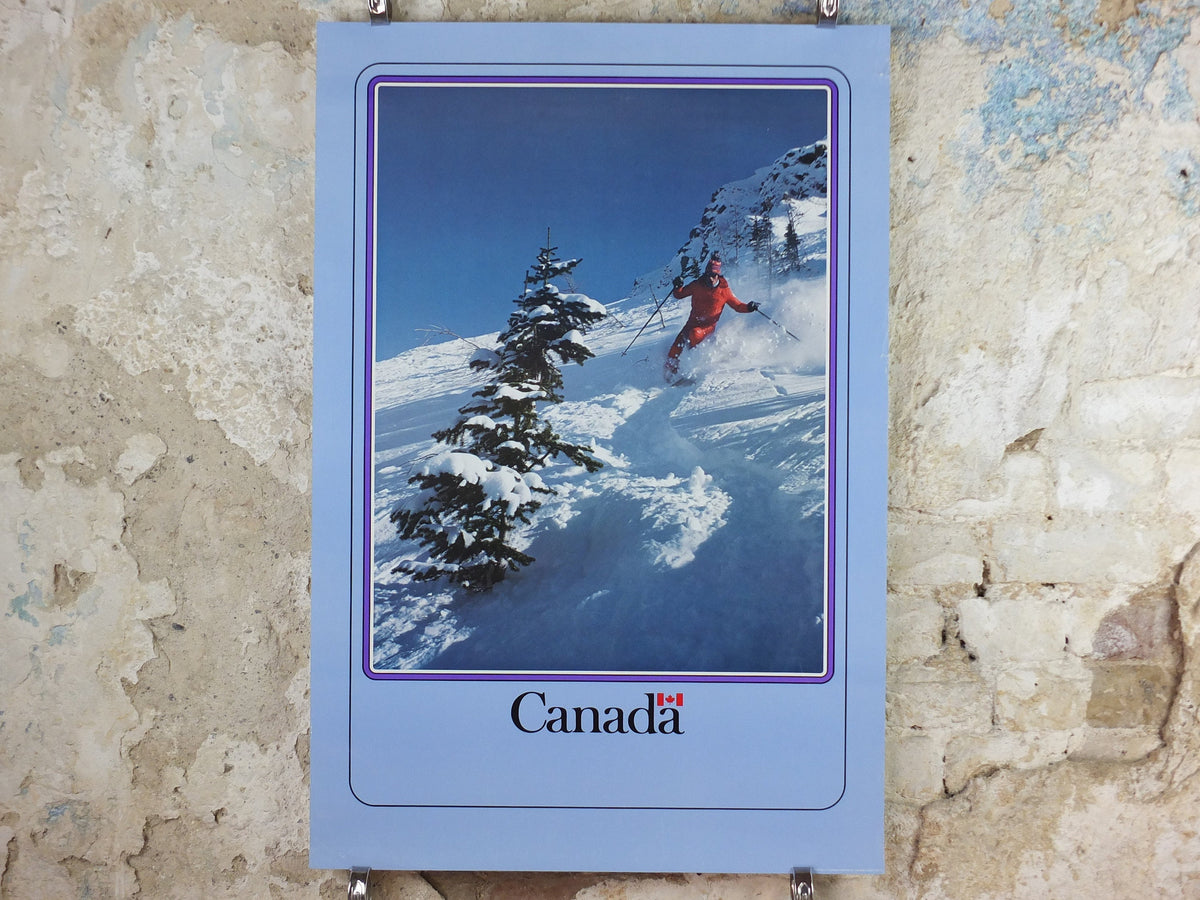 1990s Canada Ski Poster, sking holiday on snowy mountain in blue and white, tourism vacation wall art decor