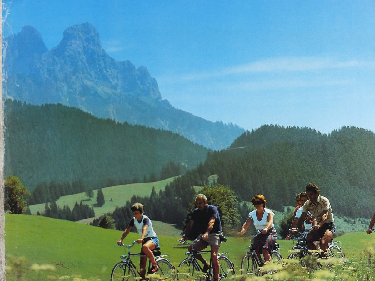 1970s Cycling in Tyrol in the Summer Poster, Austria, family on bikes, mountain tourism skiing vacation wall art decor