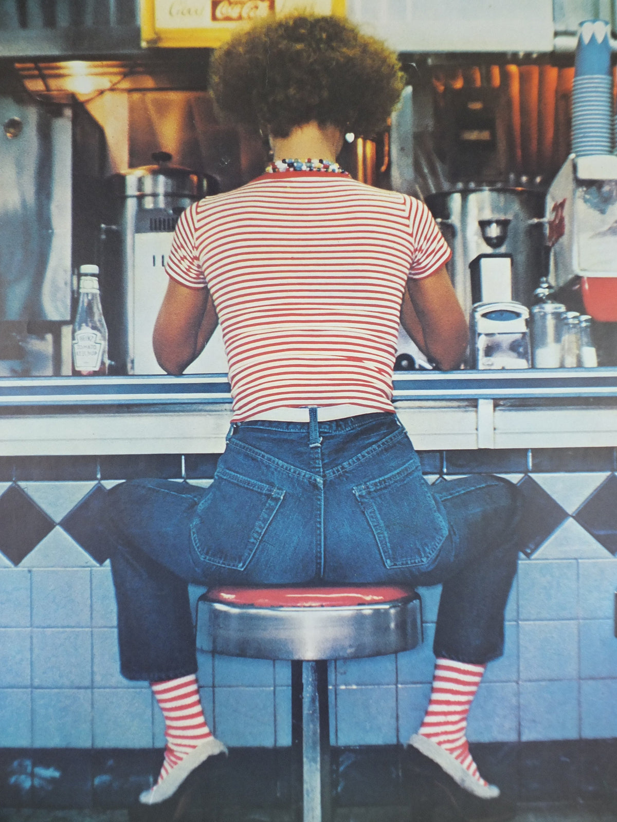 1980s Fiorucci rare Poster, Jeans spread on diner stool in red and white stripes, Italian fashion label, advertising retro wall art decor