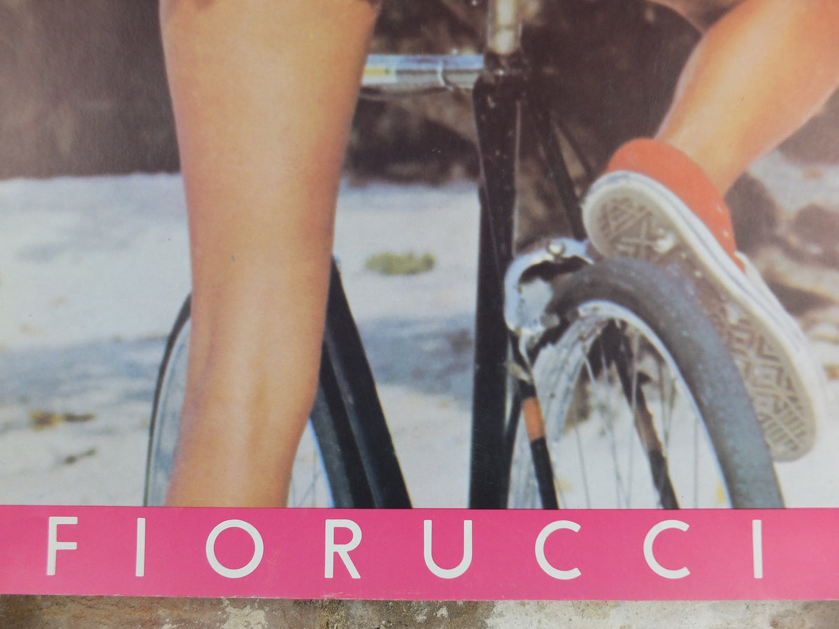 1980 Fiorucci rare Poster, girl with pink cutoff pants and backpack on a bike, Italian fashion label, advertising retro wall art decor
