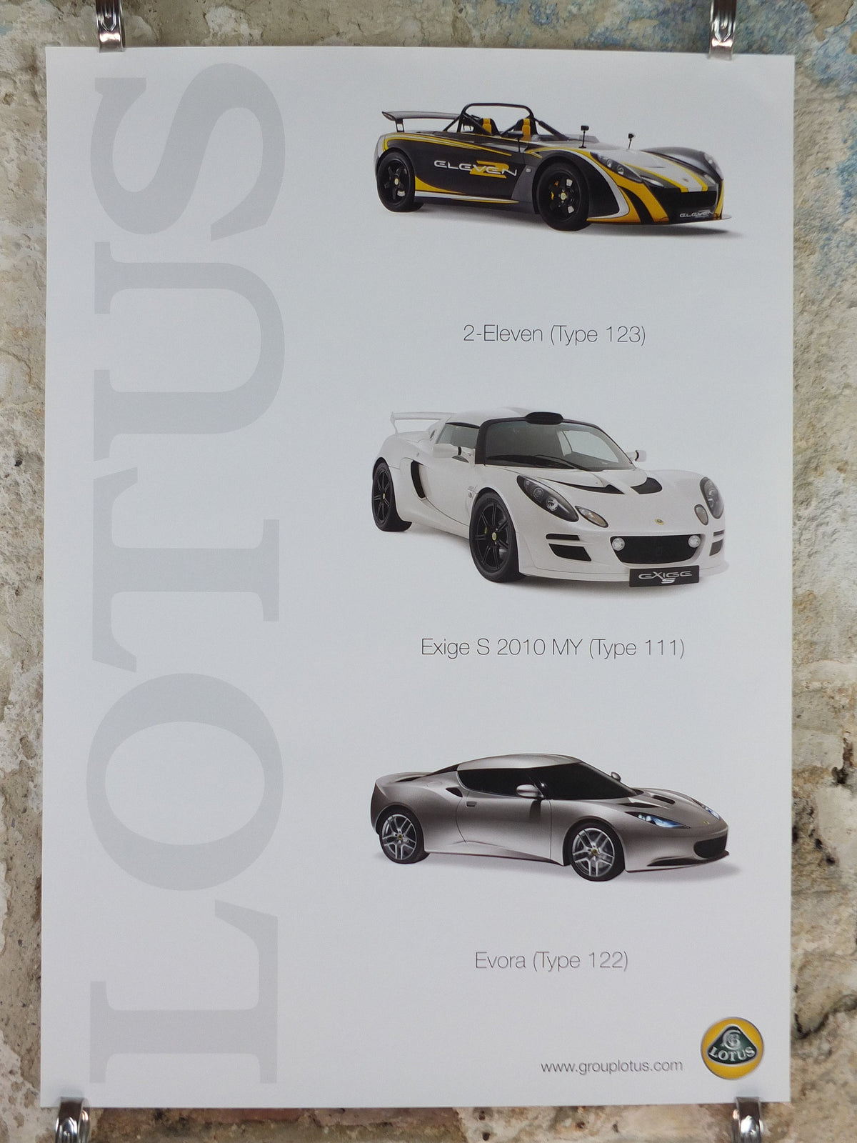 2000s Lotus Poster, showing the sports cars 2 Eleven, Exige S 2010 MY, Evora hung in dealer showroom, Group Lotus sports, wall art decor