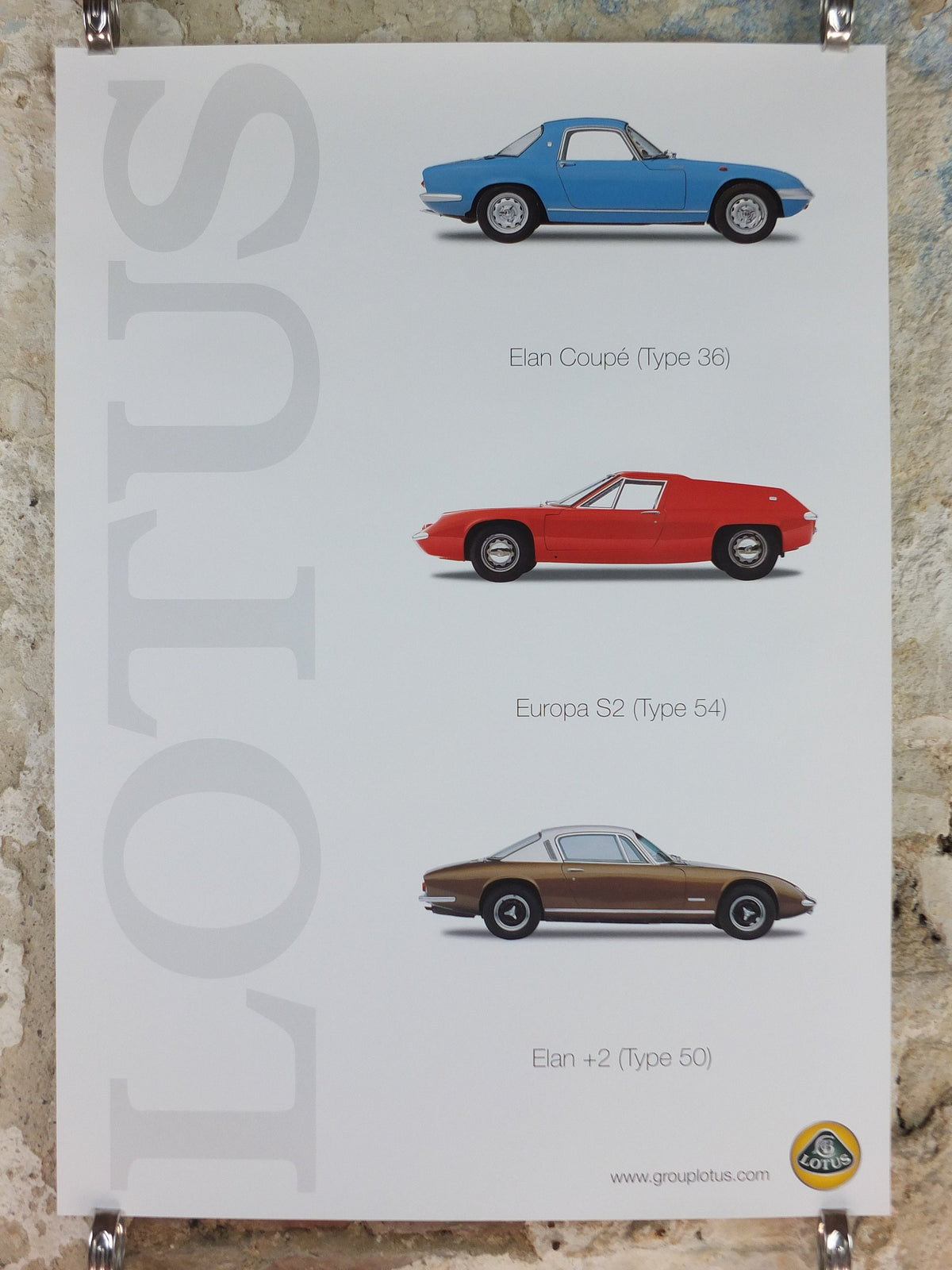 2000s Lotus Poster, showing sports cars Elan Coupe, Europa S2, Elan +2, hung in dealer showroom, Group Lotus sports, wall art decor