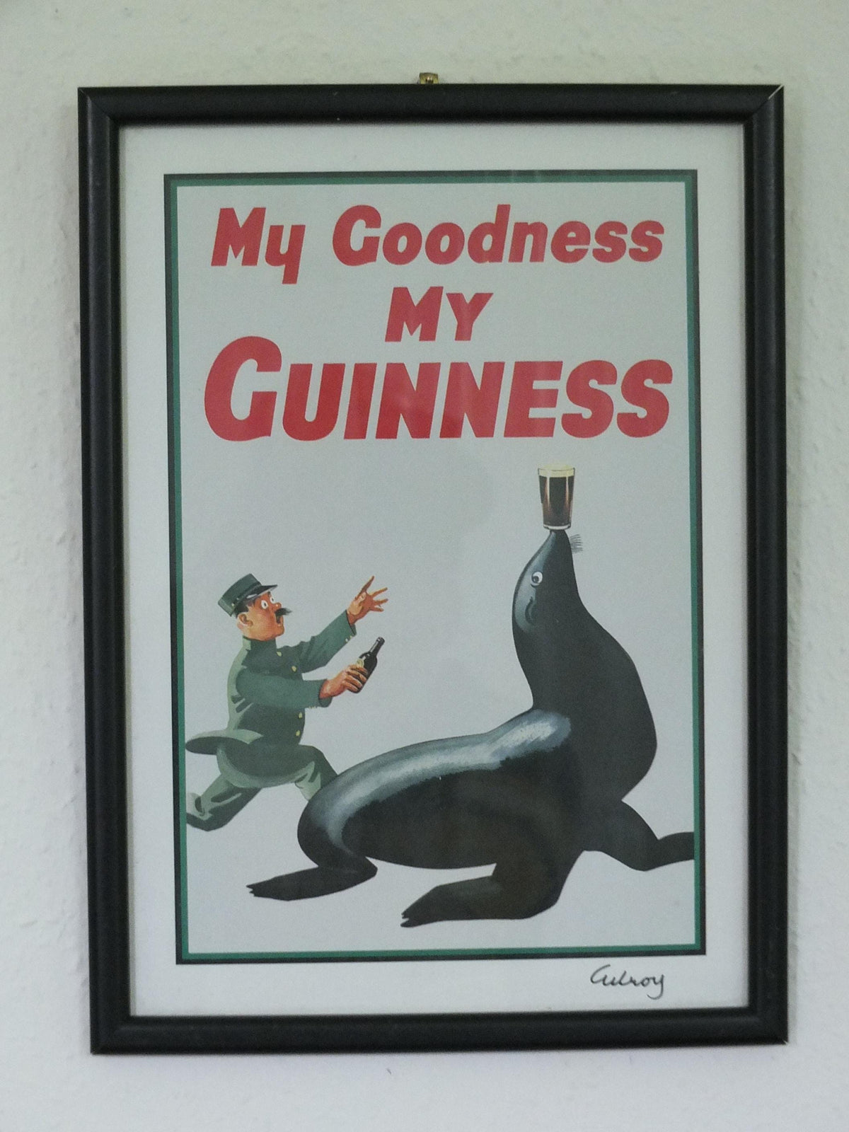 Hand signed 1981 John Gilroy Guinness Toucan Poster, Sea Lion 1935, Guinness Zookeeper with sea lion with pint on nose, wall art retro decor